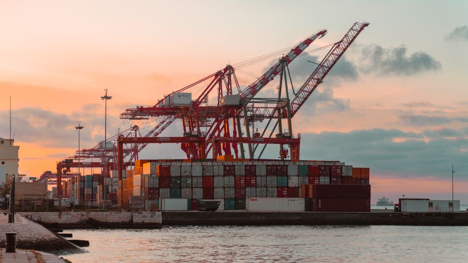 Container cranes and cargo logistics at a major shipping port