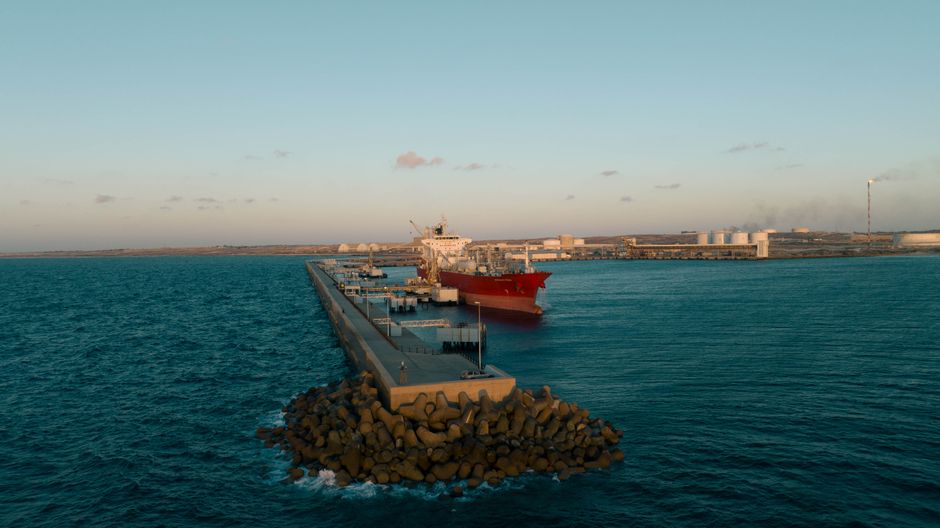 Cargo ship at an industrial harbor