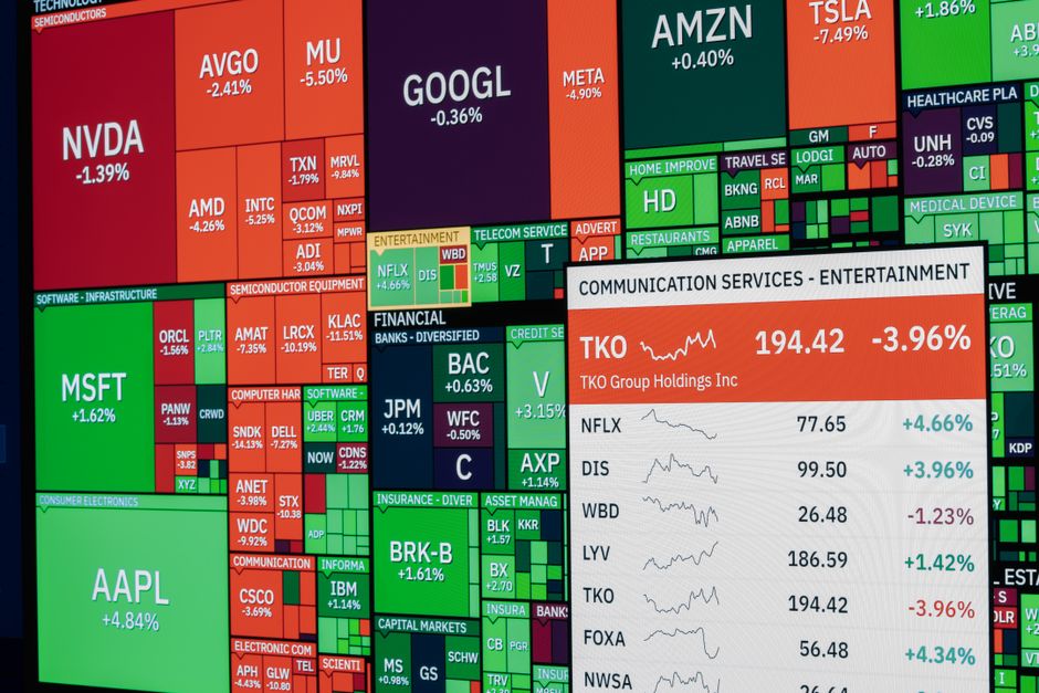 A market data display tracks changing prices as investors assess new equity supply and liquidity.