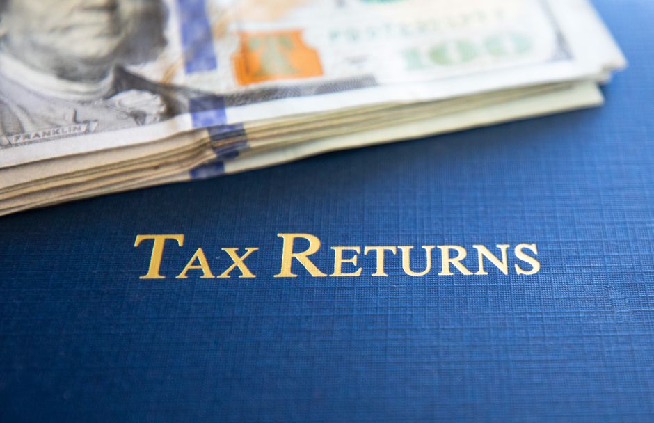 Financial documents and U.S. currency represent the capital and disclosure behind public offerings