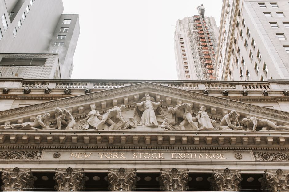 New York Stock Exchange architectural reliefs representing the exchange infrastructure behind public-market trading