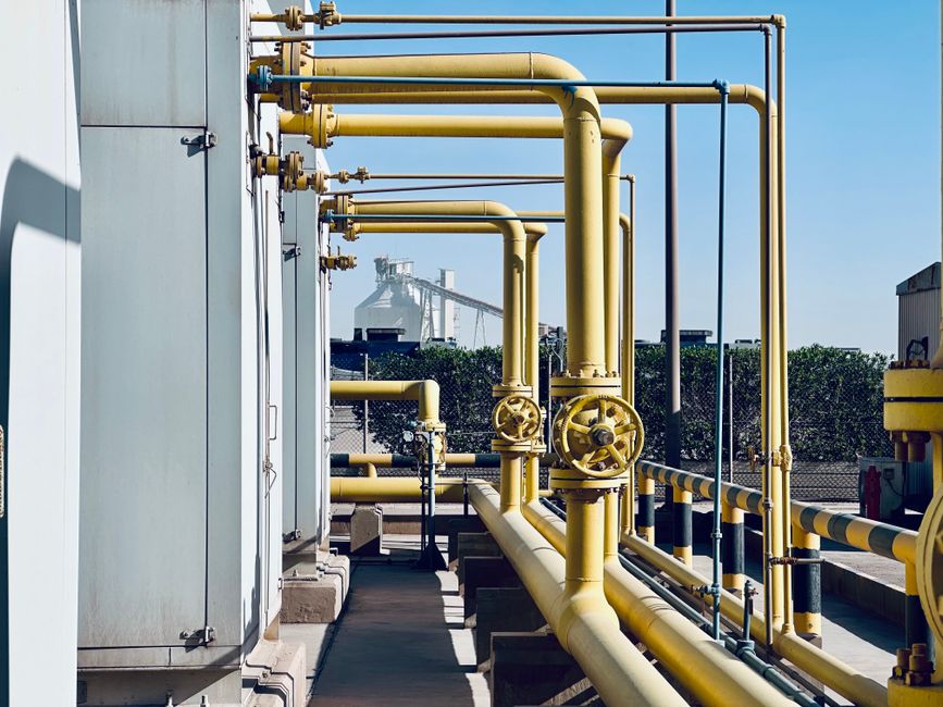 Crude oil rallied 22% in July, with Hormuz Strait throughput remaining the swing factor for supply