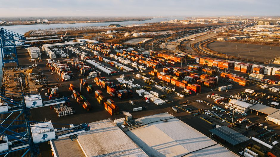 Industrial cargo cranes and containers at a logistics hub