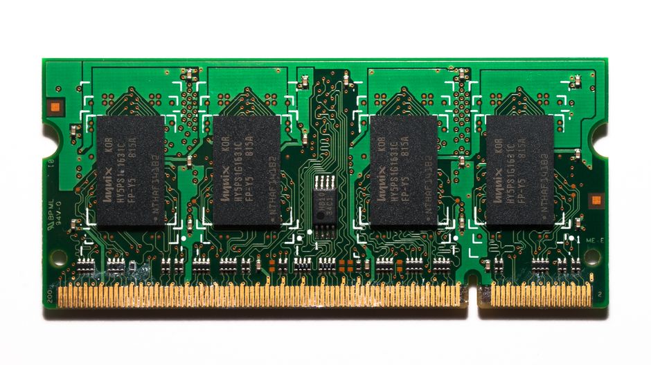 Close-up of a computer motherboard with RAM modules and circuit traces visible from above