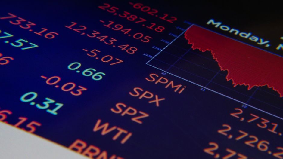 Electronic market screen displaying changing stock prices and trading data