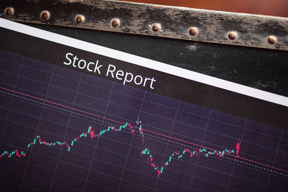 Close-up of a stock market performance graph showing upward-trending data lines.