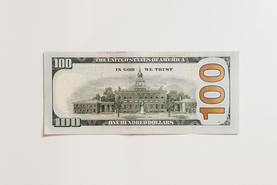 Close-up of a US dollar bill representing the market’s focus on rates and liquidity