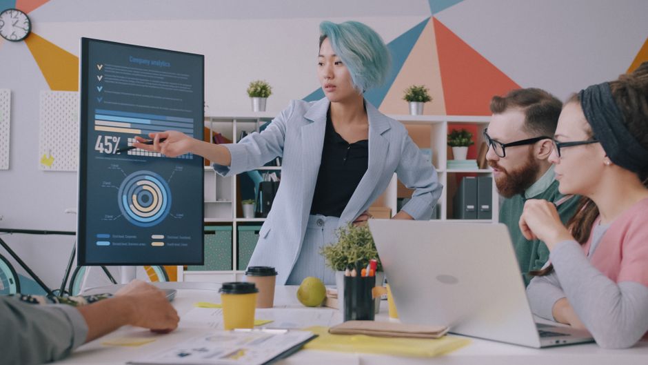 Team reviewing enterprise analytics in a modern office