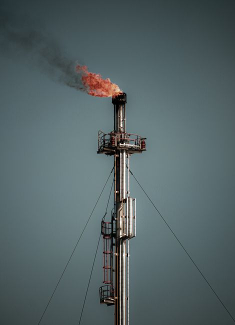 Industrial flare stack at an oil refinery
