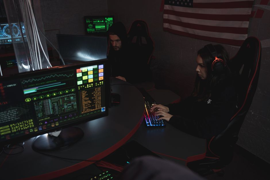Cybersecurity professionals monitor cloud and data systems