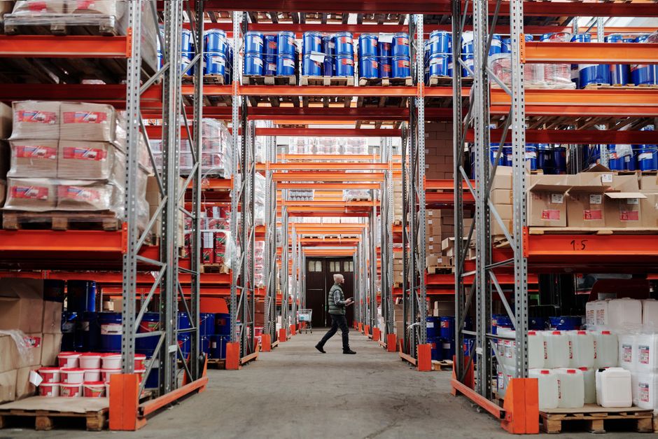 Warehouse operations illustrate the inventory and supply-chain evidence needed to validate consumer demand.