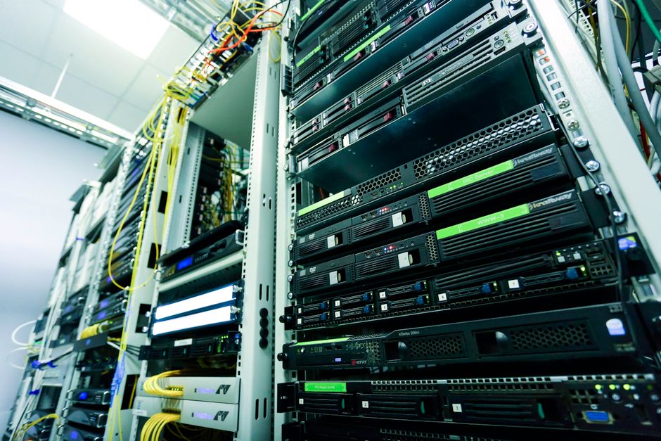 A high-tech server rack supports the cloud infrastructure behind usage-driven enterprise software demand.
