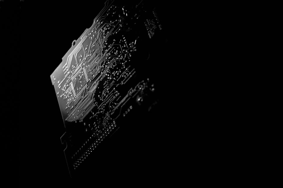 Semiconductor circuit board representing the hardware behind the AI investment cycle.