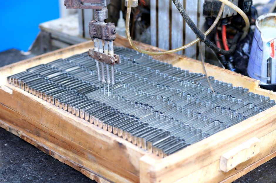 Automated machinery processing components in an industrial technology setting