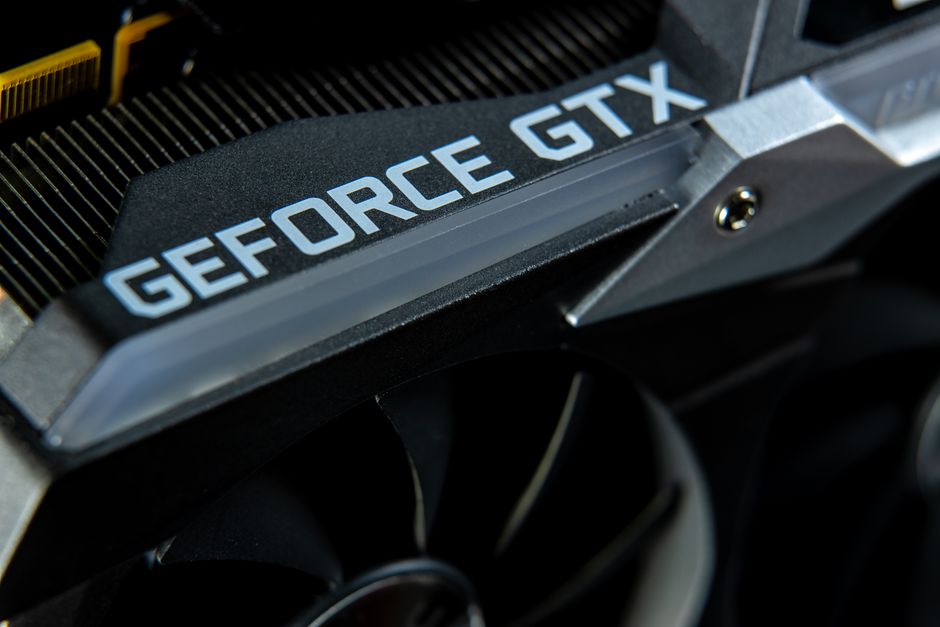 Graphics card close-up representing the GPU and memory-chip hardware trade