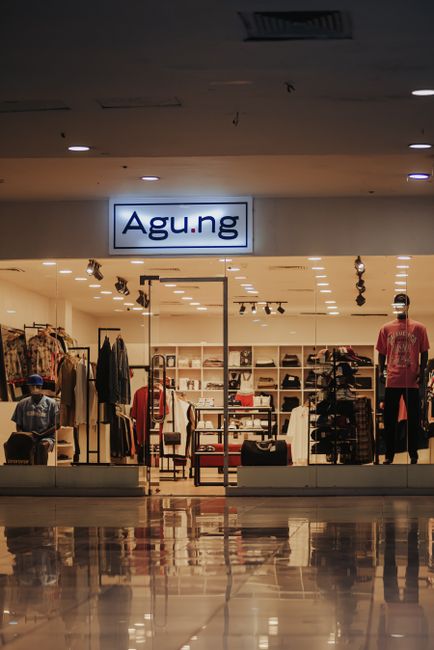 Modern clothing store interior with stylish displays and racks of merchandise