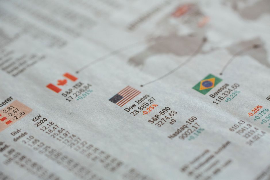 Financial statistics and market data printed in a newspaper.