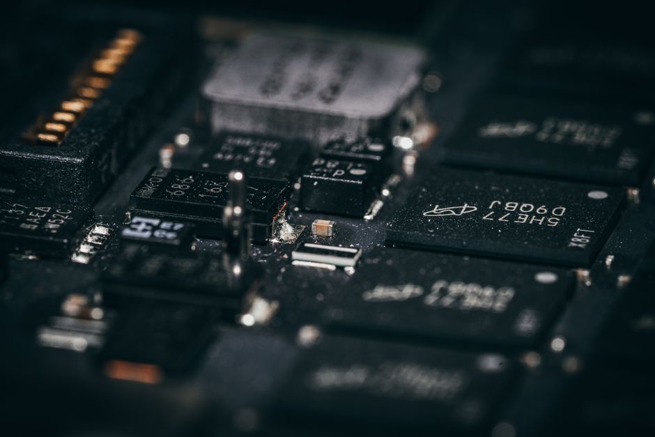 Close view of electronic circuitry representing the semiconductor supply chain.