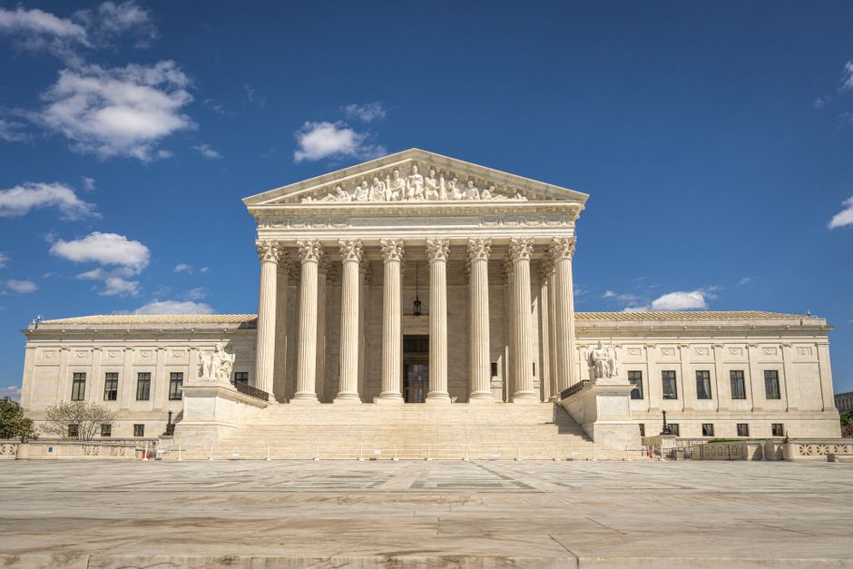 Exterior of a monumental U.S. government building representing the policy institutions shaping interest rates.