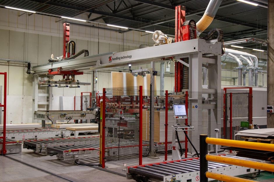 Industrial robotic arm in a modern manufacturing facility